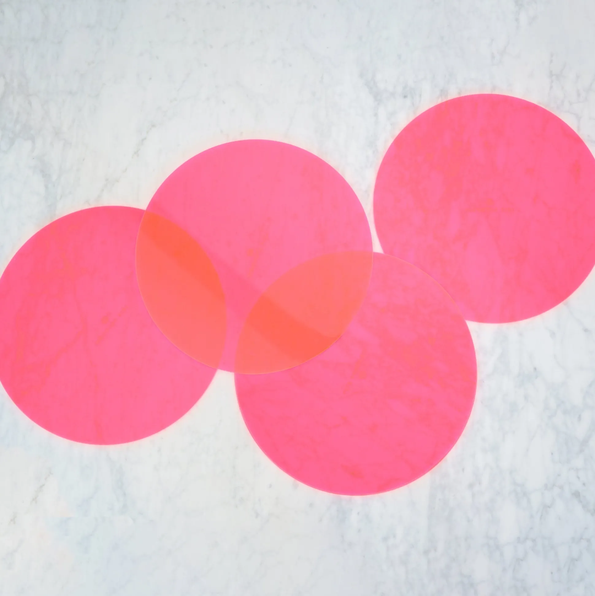 NEON PINK LUNA ROUND SET OF 4 PLACEMATS